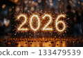 Sparkler Numbers 2026 Celebration With Golden Sparks, Firelight Beams, Festive Backdrop And Joyful Crowd. 133479539