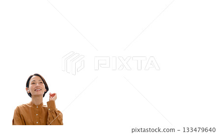 Woman listening to music or radio (small) Woman listening to music or radio (small) 133479640