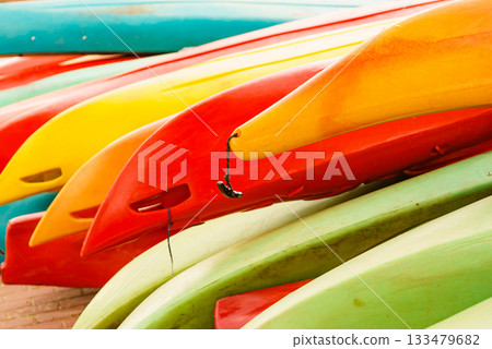Kayaks in stack outdoors Kayaks in stack outdoors 133479682