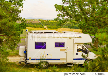 Rv camper camping on nature 133480082