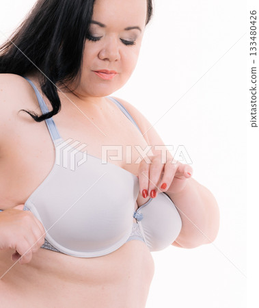 Big woman wearing bra 133480426