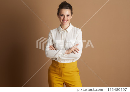 Empowered Businesswoman with Crossed Arms 133480597