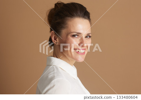 Confident Businesswoman Smiling Back 133480604