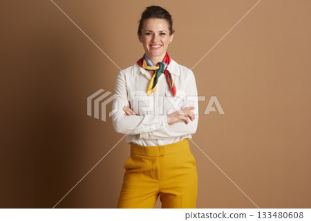 Confident Businesswoman in Scarf with Arms Crossed 133480608