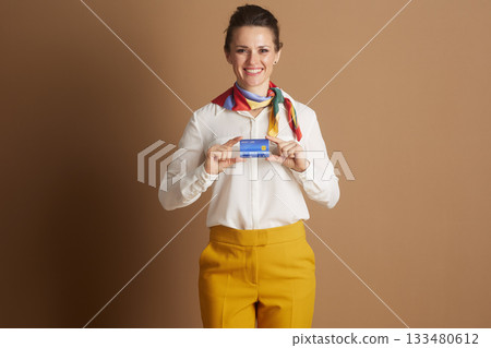 Cheerful Businesswoman Holding Credit Card Cheerful Businesswoman Holding Credit Card 133480612