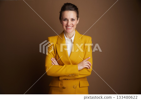 Confident Businesswoman with Crossed Arms 133480622