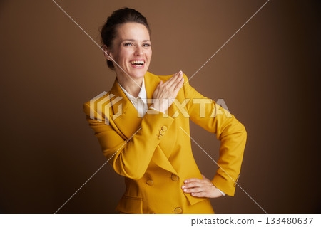 Empowered Business Leader in Yellow Blazer 133480637