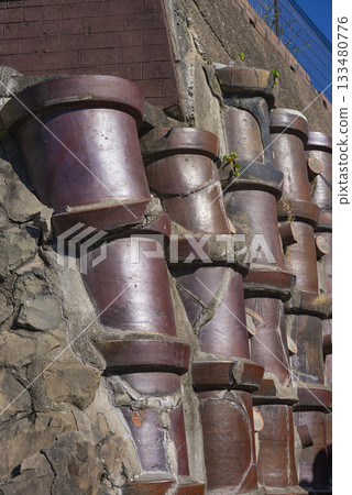 [Vertical photo] Ceramic Pipe Hill on the Pottery Walk 133480776