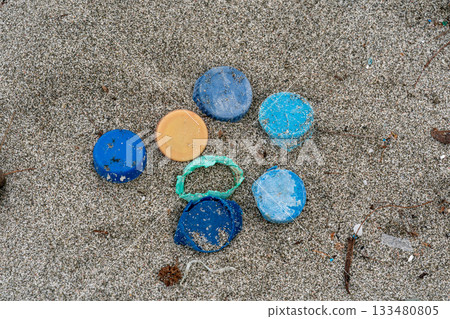 Plastic bottle cap washed up on the shore, Ogasawara 133480805