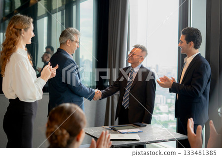 Successful businessman handshake with partnership during corporate meeting for celebrating. Successful businessman handshake with partnership during corporate meeting for celebrating. 133481385