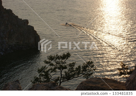 Golden water of Lake Baikal. Mystical Olkhon Island. Golden water of Lake Baikal. Mystical Olkhon Island. 133481835