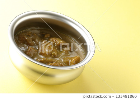 Chicken curry served on silver tableware Chicken curry served on silver tableware 133481860