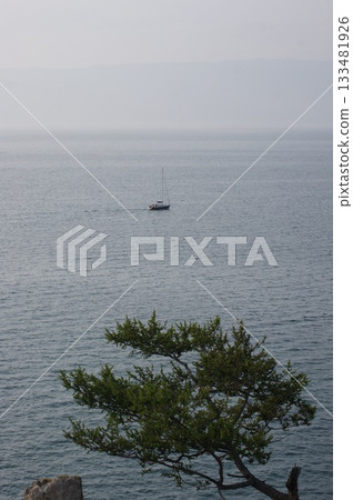 A boat with fishermen on Lake Baikal. 133481926