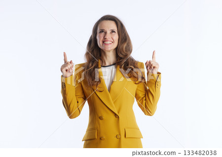 Enthusiastic Woman Pointing Upwards with Idea 133482038