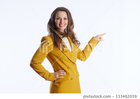Confident Woman Pointing Right with Clear Direction 133482039
