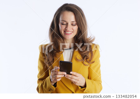 Engaged Businesswoman Using a Smartphone Engaged Businesswoman Using a Smartphone 133482054