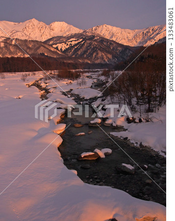 Matsukawa River and Hakuba Sanzan's Morning Glory in midwinter 133483061