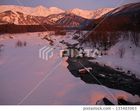 The Hakuba Sanzan mountains and Matsukawa River, part of the Himekawa River system, sparkling in the morning glow The Hakuba Sanzan mountains and Matsukawa River, part of the Himekawa River system, sparkling in the morning glow 133483063