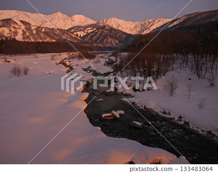 The Hakuba Sanzan mountains and Matsukawa River, part of the Himekawa River system, sparkling in the morning glow The Hakuba Sanzan mountains and Matsukawa River, part of the Himekawa River system, sparkling in the morning glow 133483064
