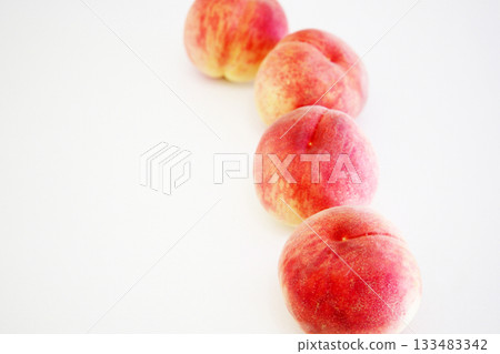 Freshly picked peaches 133483342