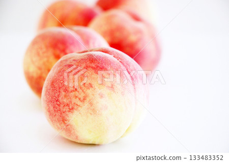 Freshly picked peaches 133483352