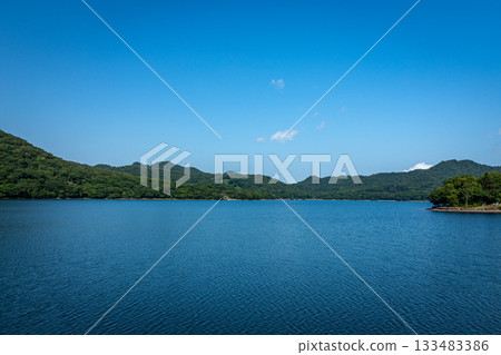 Lake Onuma in summer with the blue sky spreading across its surface (Maebashi City, Gunma Prefecture) Lake Onuma in summer with the blue sky spreading across its surface (Maebashi City, Gunma Prefecture) 133483386