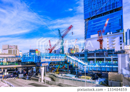 Tokyo cityscape, Japan, November 24th. Flowing clouds... Crawler cranes, cylindrical structures, and materials lined up = Shibuya Tokyo cityscape, Japan, November 24th. Flowing clouds... Crawler cranes, cylindrical structures, and materials lined up = Shibuya 133484859