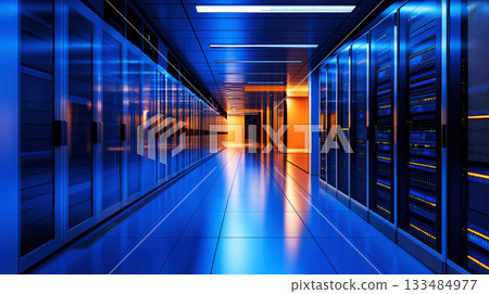 Rows of server racks in a modern data center, with glowing lights and a sense of power and technology. 133484977