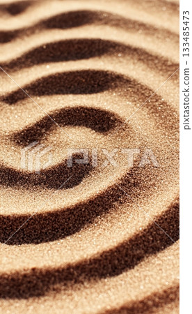 Abstract Textured Background of Rippled Sand with Spiraling Design Featuring Lines and Curves Abstract Textured Background of Rippled Sand with Spiraling Design Featuring Lines and Curves 133485473
