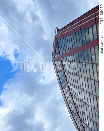 Cloudy sky and glass surface Cloudy sky and glass surface 133486050