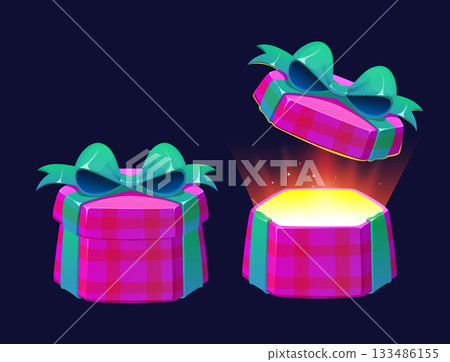 Cartoon open Christmas magic gift surprise box, glowing game present. Vector pink hexagonal giftbox with green bow, checked wrapping and lid floating with magical glowing light emerging from within Cartoon open Christmas magic gift surprise box, glowing game present. Vector pink hexagonal giftbox with green bow, checked wrapping and lid floating with magical glowing light emerging from within 133486155