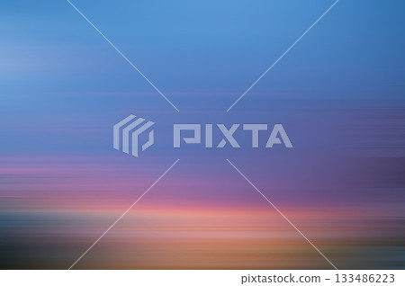 Blur motion background, blue purple orange gradient. Magenta sunset background motion blur 133486223