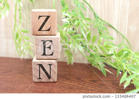 Relaxing wooden blocks of ZEN and green leaves. A soothing image. 133486407