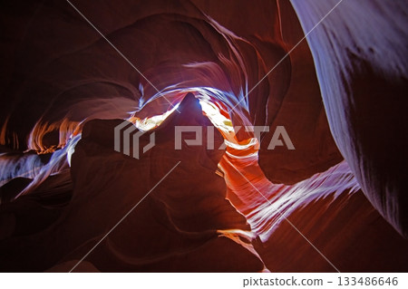 Antelope Canyon light opening in sandstone 133486646