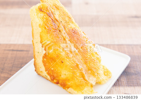 Delicious grilled cheese and tuna sandwich 133486839