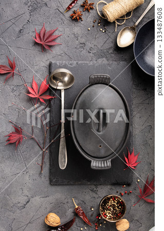 Rustic Culinary Flat-Lay Collection with Vintage Silverware, Seasonal Accents, Herbs, Spices, and Kitchen Tools 133487608