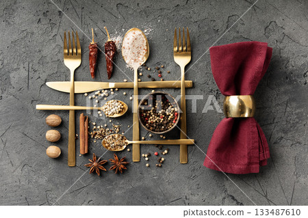 Culinary Flat-Lay Collection with Modern Gold Cutlery, Vintage Utensils, Spices, Herbs, Seasonal Leaves, and Kitchen Decor 133487610