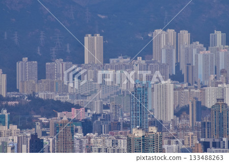 The view of Hong Kong cityscape from the Peak of Hong Kong. Beautiful and stunning view of Hong Kong. Hong Kong Cityscape and skyline.  133488263
