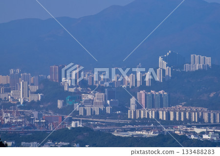 The view of Hong Kong cityscape from the Peak of Hong Kong. Beautiful and stunning view of Hong Kong. Hong Kong Cityscape and skyline. The view of Hong Kong cityscape from the Peak of Hong Kong. Beautiful and stunning view of Hong Kong. Hong Kong Cityscape and skyline. 133488283