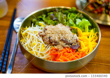 Bibimbap, Korean spicy salad with rice bowl, bulgogi. Traditionally Korean food 133488340