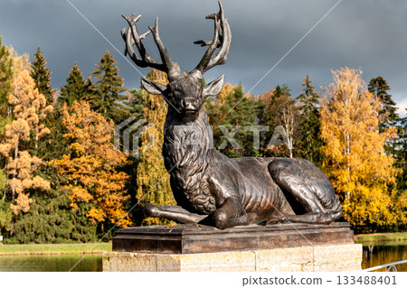 Sculpture of a deer on a pedestal. 133488401