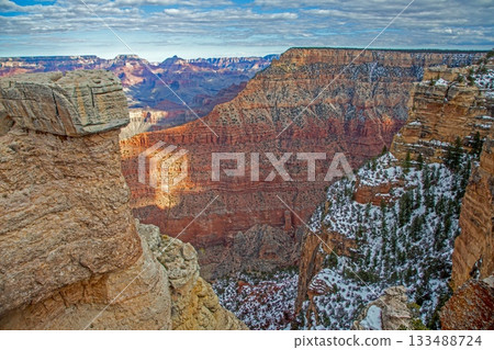 Grand Canyon steep cliffs with winter snow 133488724