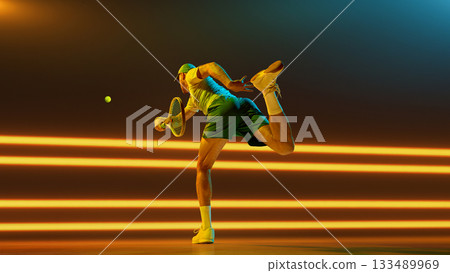 Male tennis player hitting forehand swing with power and determination. Handmade collage Male tennis player hitting forehand swing with power and determination. Handmade collage 133489969
