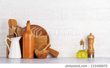 Kitchen utensils and spices on table 133490670