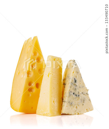Assorted cheeses on white background Assorted cheeses on white background 133490710