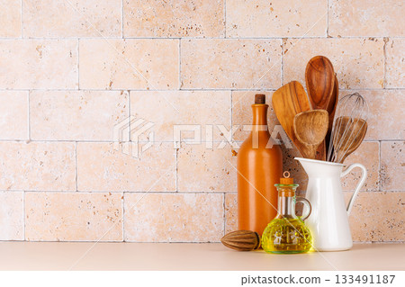Kitchen utensils and cutting boards on table Kitchen utensils and cutting boards on table 133491187