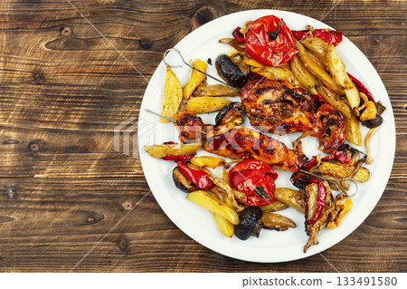 Chicken breast baked in vegetables. Chicken breast baked in vegetables. 133491580