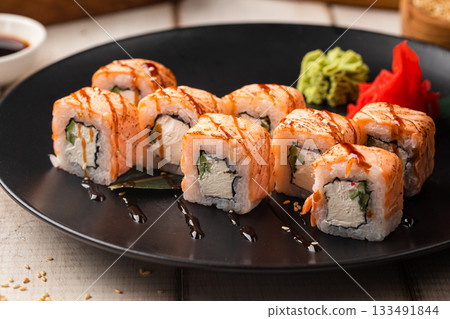 Philadelphia sushi rolls with seared salmon 133491844
