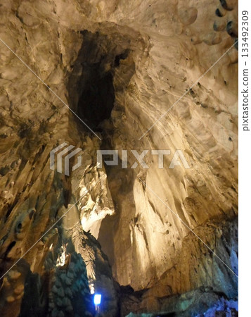 Illuminated Cave Interior Highlighting Dramatic Rock Formations 133492309