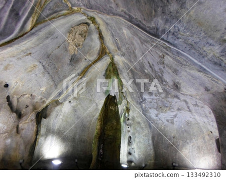 Close Up of a Rock Formation Featuring a Tall Column Close Up of a Rock Formation Featuring a Tall Column 133492310